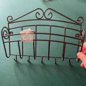 Elegant Black Metal Wall Rack